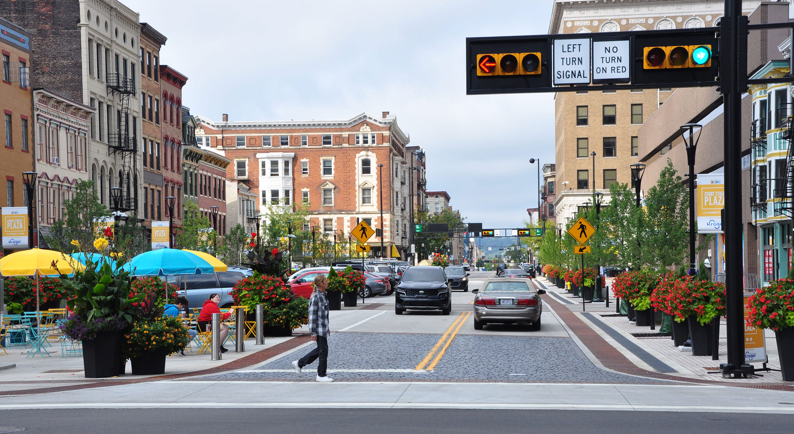 Urban downtown blending historic and modern architecture, showcasing site/civil engineering.