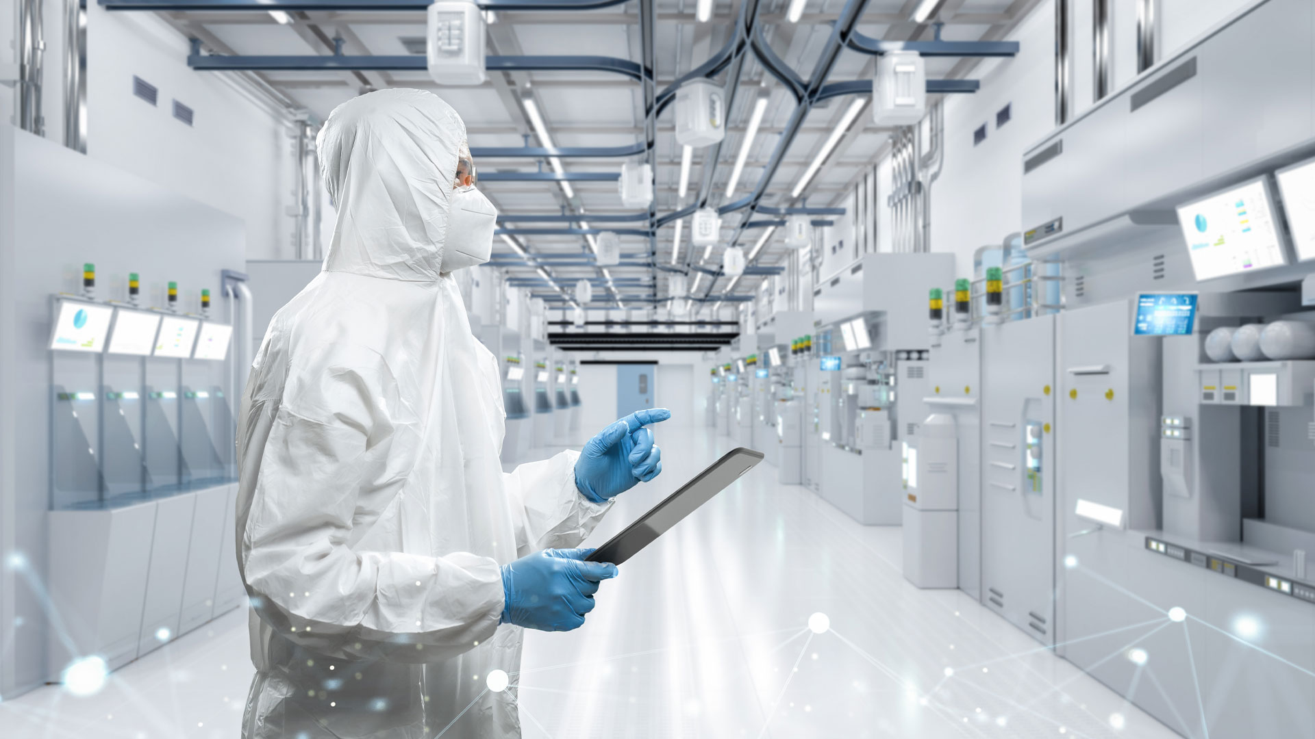 A technician in cleanroom gear uses a digital tablet inside a high-tech semiconductor facility, representing modernization needs in Pre-BIM fabs.